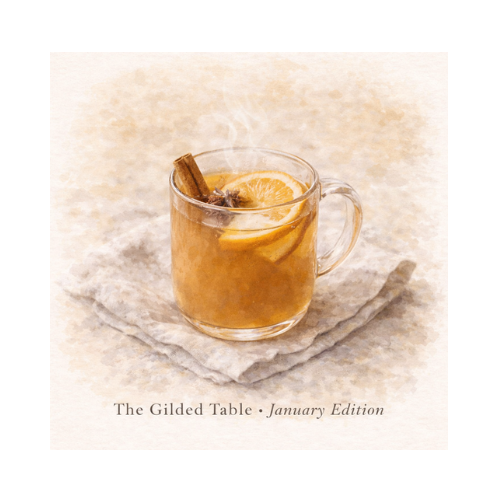 Warm apple-orange cider simmered with winter spices, served in a cozy mug for a comforting January drink