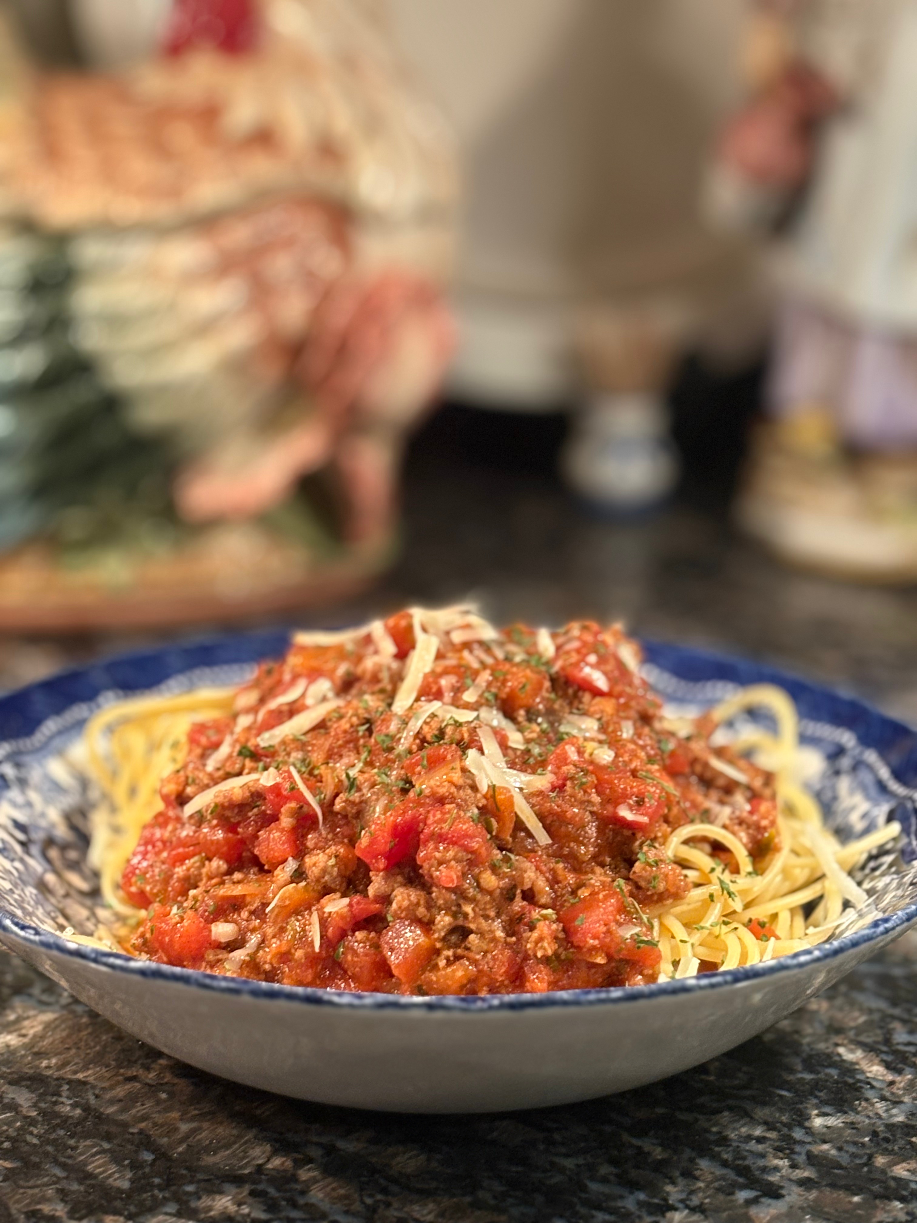 Dad's Sunday Sauce plated over pasta